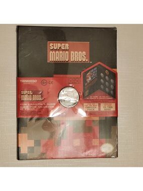 THINKGEEK Super Mario Bros. Coin Collector's Album BNIP Holds 10 Coins NINTENDO